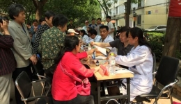 致公党省千佛山医院支部走进社区成功开展大型义诊活动